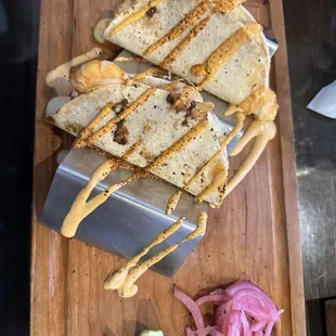 a wooden cutting board with a variety of food items