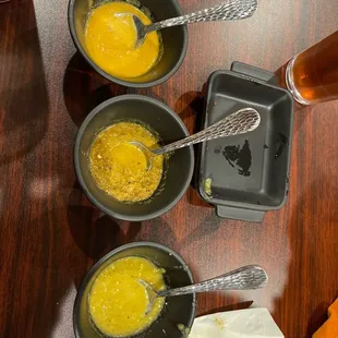 3 different types of salsa that came with 3 pieces of a fry bread. Good "kick" to each of them