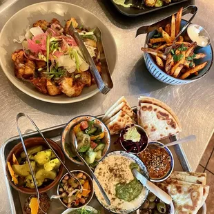 a variety of dishes of food