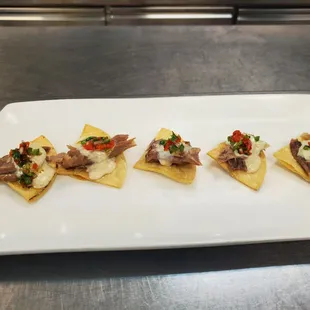 - Duck Confit, Crisp Corn Tortilla, Manchego Fondue, Jalapeno Relish (hors d'oeuvre)  (Photo from our tasting)