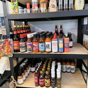 a shelf of spices and condiments
