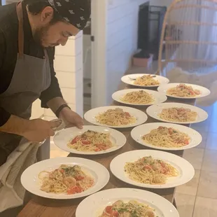 Sous chef Jose Lopez finishing plating
