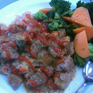 Pork Chili Verde over Southern-style Rice with Broccoli and Carrots