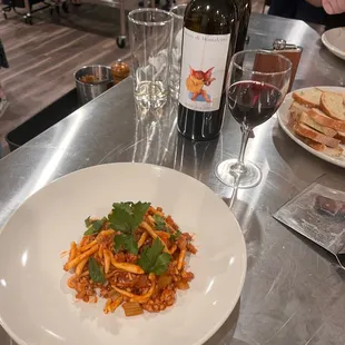 Final product! Handmade pasta and a pork red sauce! BYOB, of course.