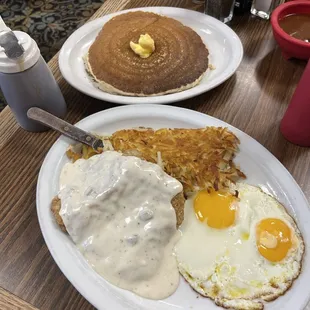 Chicken Fried Steak with eggs, hashbrowns, and a pancake