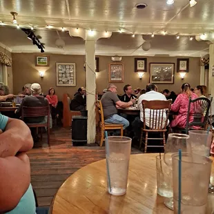 a group of people sitting at a table