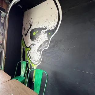a skull painted on the wall