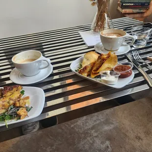 Quiche and Vanilla Latte (left) Breakfast Burrito and Glamp Fire Latte (right)