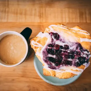 a pastry and a cup of coffee