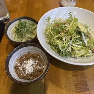 Frisée salad with a side of beans and cilantro rice