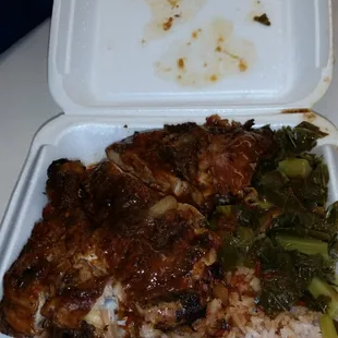 Jerk chicken , rice and greens