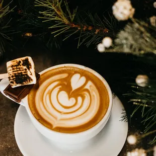 a cup of coffee and a marshmallow