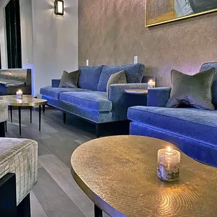 blue couches and tables
