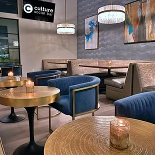 seating and tables with candles