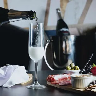 a wine being poured into a glass
