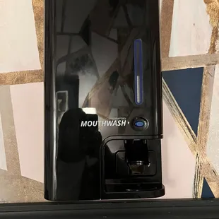 Mouthwash machine the the bathroom