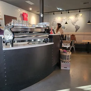 a woman standing at the counter