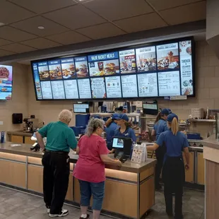 customers ordering food at the counter