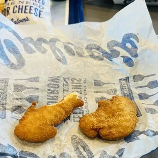 Chicken tenders the size of a nugget.