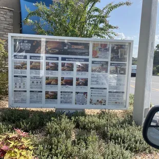 a menu in the window of a car