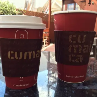 two cups of coffee on a table