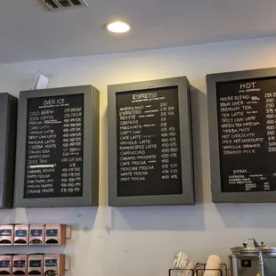 menus on the wall of a coffee shop