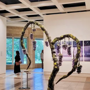 Wisteria by Debora Moore, by blown and sculpted glass and stones.