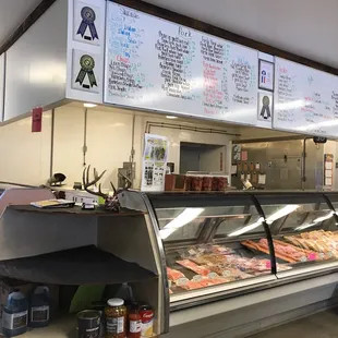 a display of meats in a deli