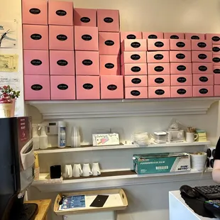 a woman sitting in front of a computer