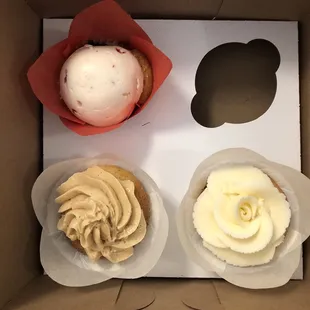 three cupcakes in a box