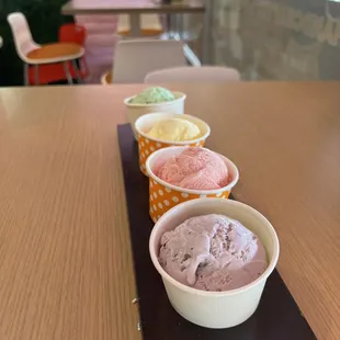 Rose pistachio, rasmalai, guava, blueberry lavender ice cream flight.