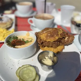 Chicken and biscuits with a sweet potato biscuit and pimento cheese grits.