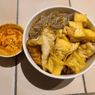 Combo. Tofu &amp; dumplings. Sauce on side. Level 8.
