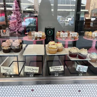 a display of cupcakes