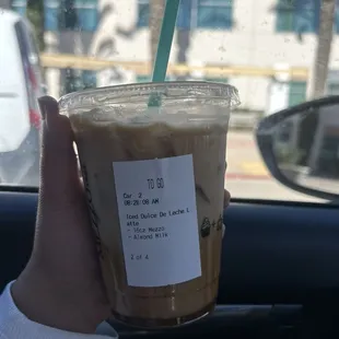 A Medium Dulce De Leche Latte with Almond Milk