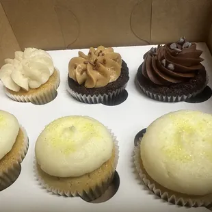 a dozen cupcakes in a box