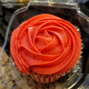 red frosting on a cupcake