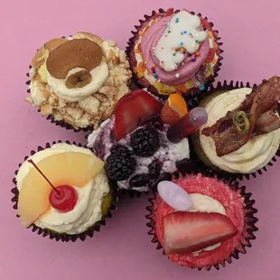 Party Pebble, Sunday Morning, Strawberry Crunch Milkshake, Uptown Bae, Home Sweet Home, and Bottomless Sangria cupcakes