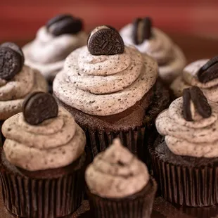 Cookies &amp; Cream Cupcake - Chocolate Cake frosted with chocolate cookie crumb buttercream and topped with crumbed Oreo crumbs.
