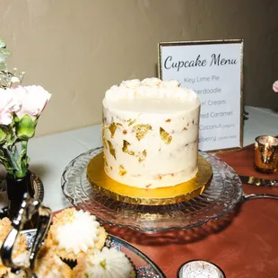 6-inch Vanilla Salted Caramel cake with gold flakes for our wedding. Delicious!