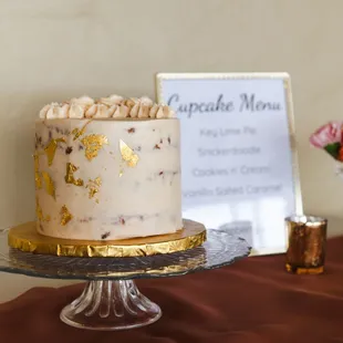 6-inch Vanilla Salted Caramel cake with gold flakes for our wedding. Delicious!