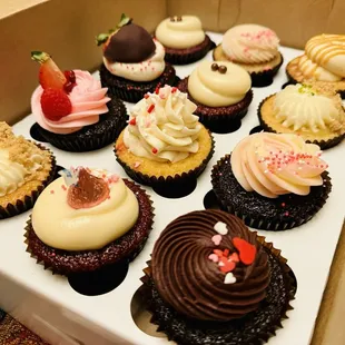 Got these yummies today for Valentine's Day! A dozen cupcakes instead of a dozen roses! The BEST one was the key lime pie cupcake!