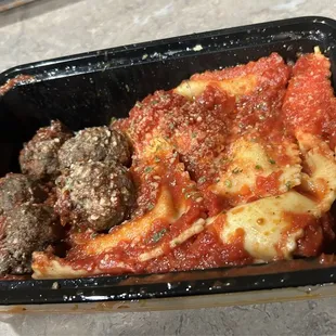Our to go order of ravioli and meatballs