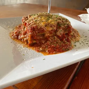 Lasagna comes out hot picture perfect n layers of pasta line up beautiful   Back for a second time from STL to KC let's eat