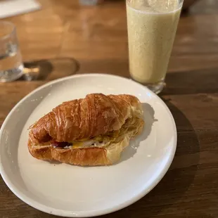 Breakfast Sandwich ($7), tropical chia smoothie ($5.50)