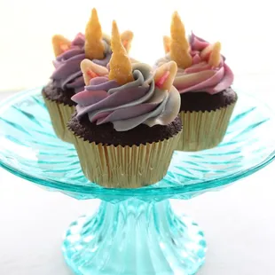 Custom unicorn cupcakes with sugar cookie ears and horns!