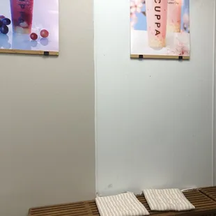 a wooden bench in a coffee shop