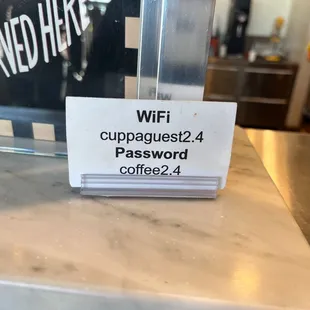 a close up of a sign on a counter