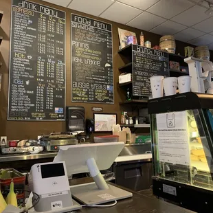 menus on the wall of a coffee shop