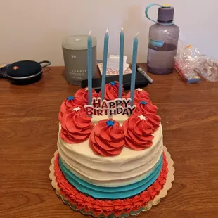 Strawberry cake with strawberry filling and cream cheese frosting.